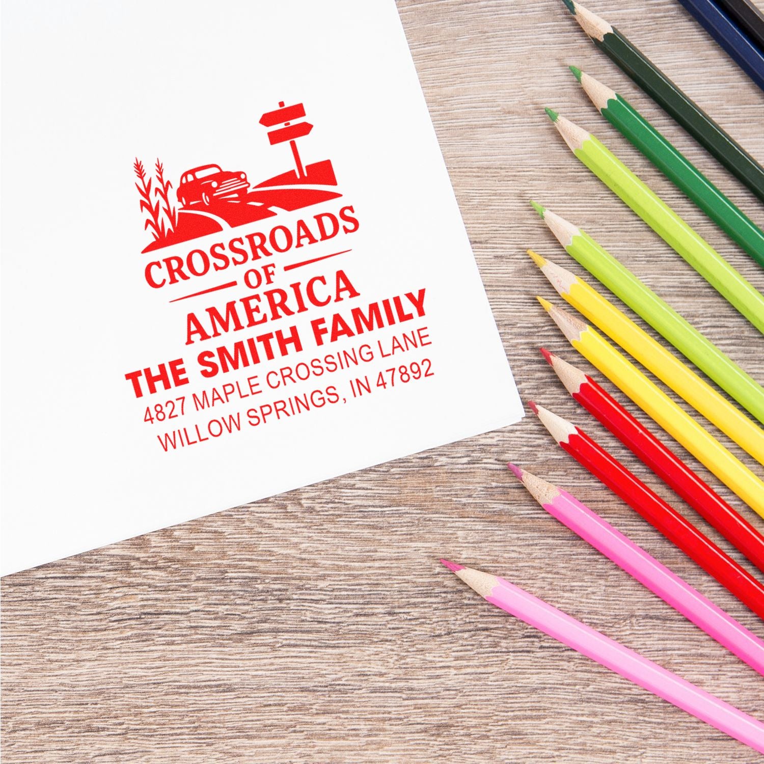 Custom address rubber stamp impression for The Smith Family, featuring a Crossroads of America design on personalized stationery.