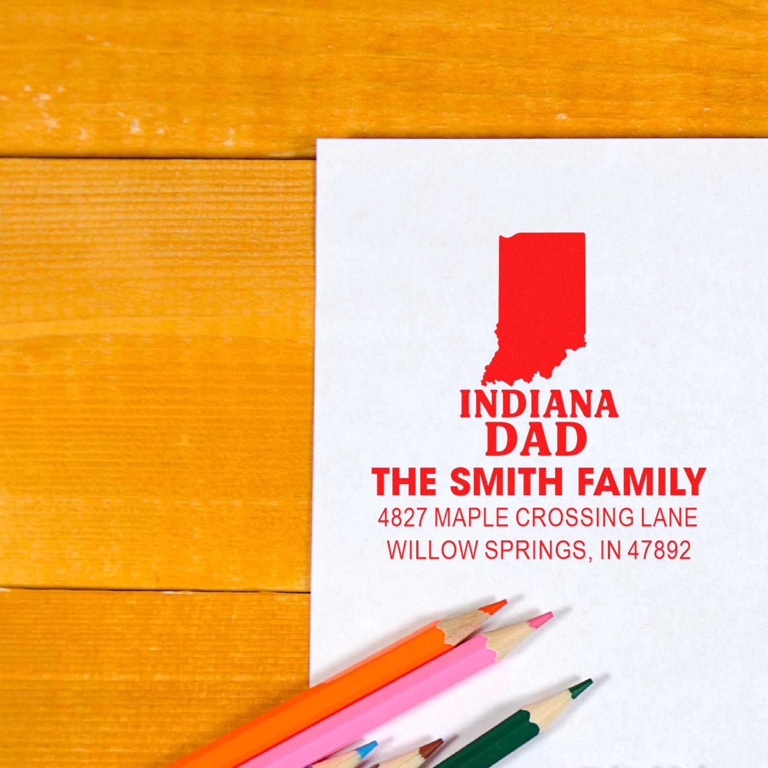 Custom Indiana Dad rubber address stamp with Indiana silhouette, family name, and mailing address on stationery.