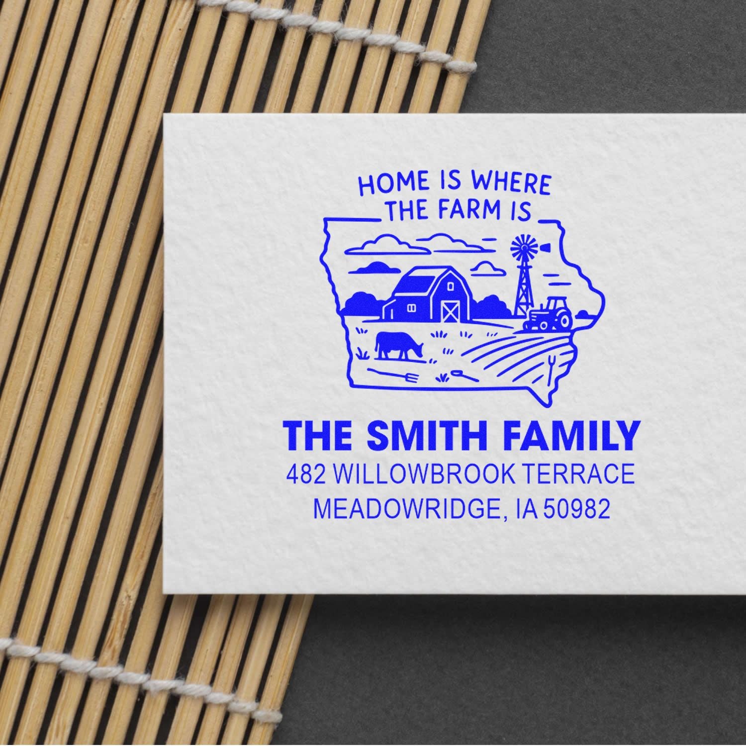 Custom return address rubber stamp for The Smith Family, with Home Is Where the Farm Is farm scene and state outline.