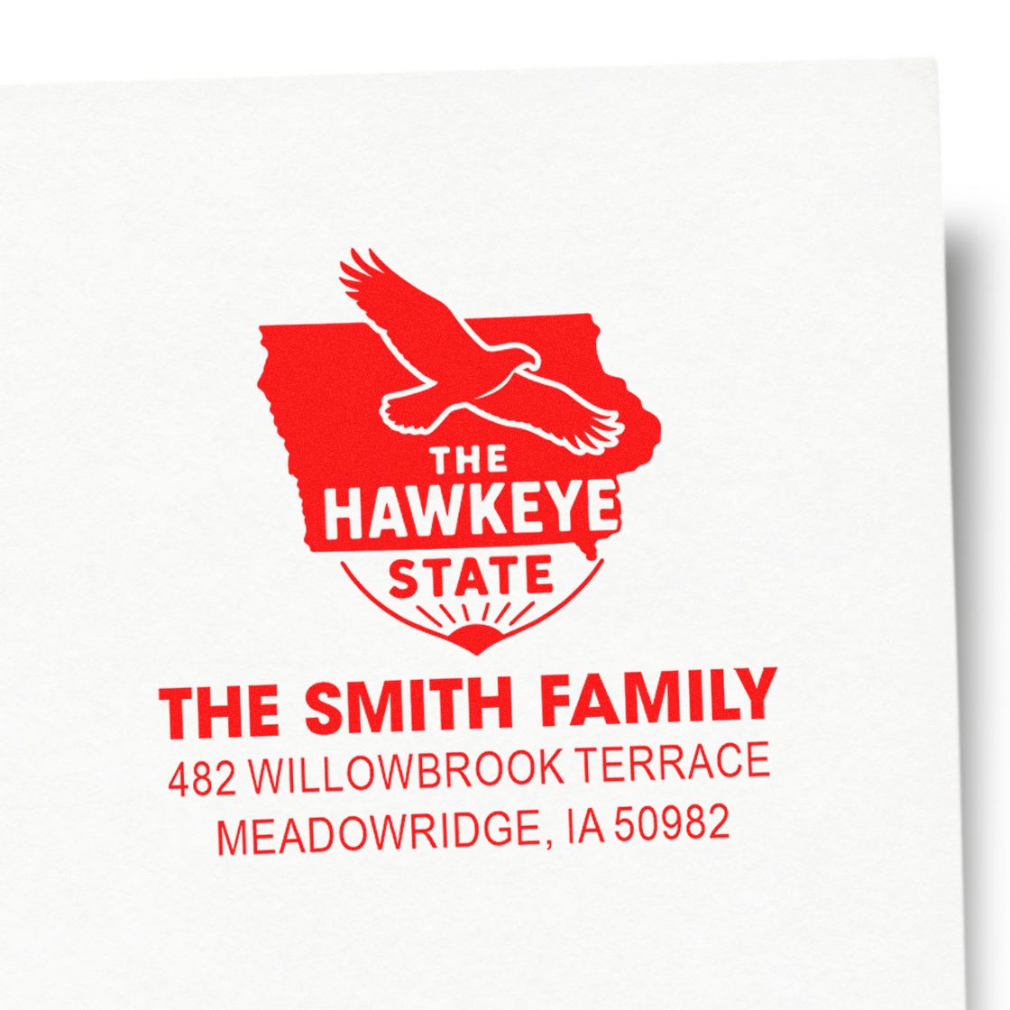 Personalized return address rubber stamp for The Smith Family, featuring an Iowa Hawkeye State eagle design and Meadowridge, IA 50982.