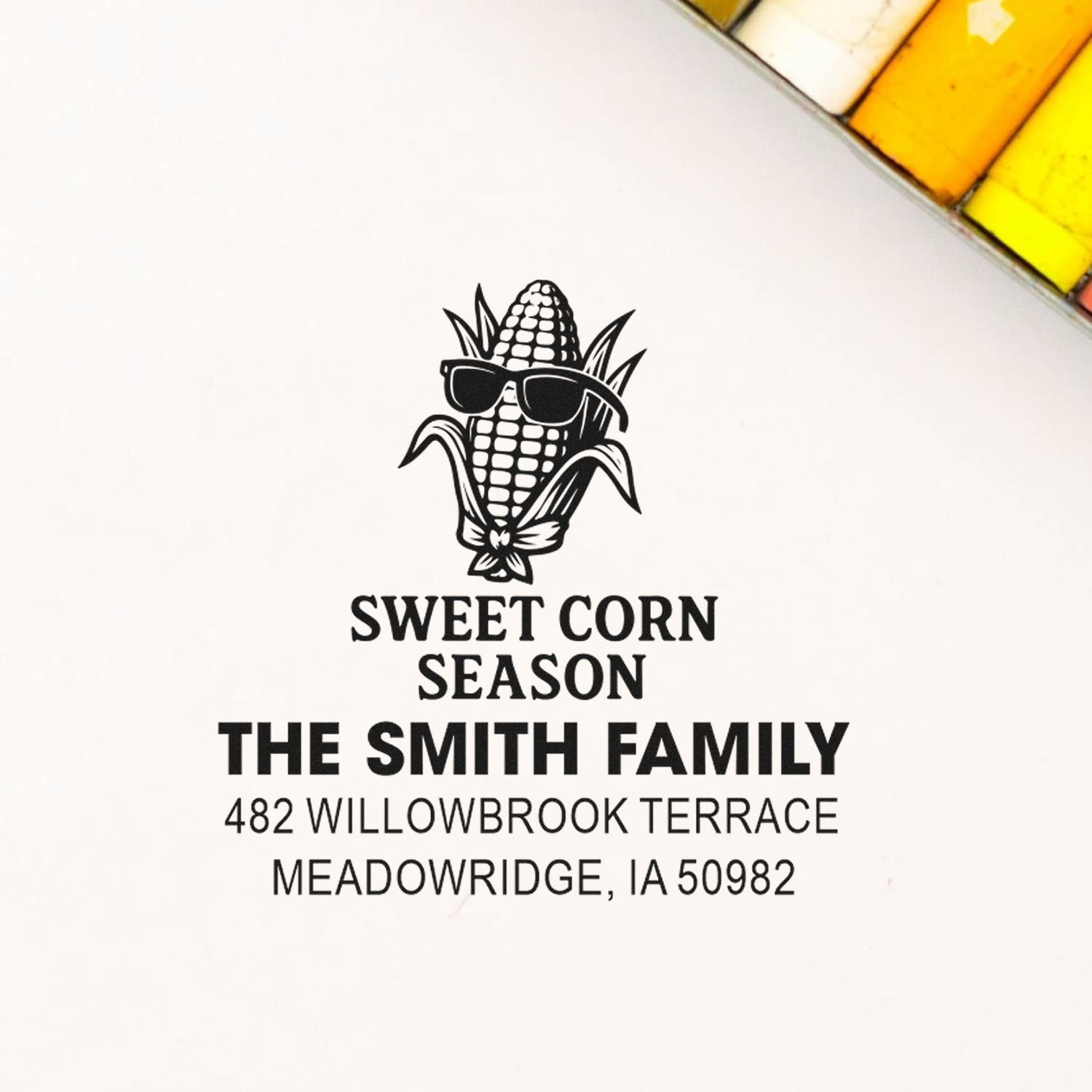 Personalized rubber address stamp with corn graphic and Sweet Corn Season for The Smith Family, Meadowridge, IA.