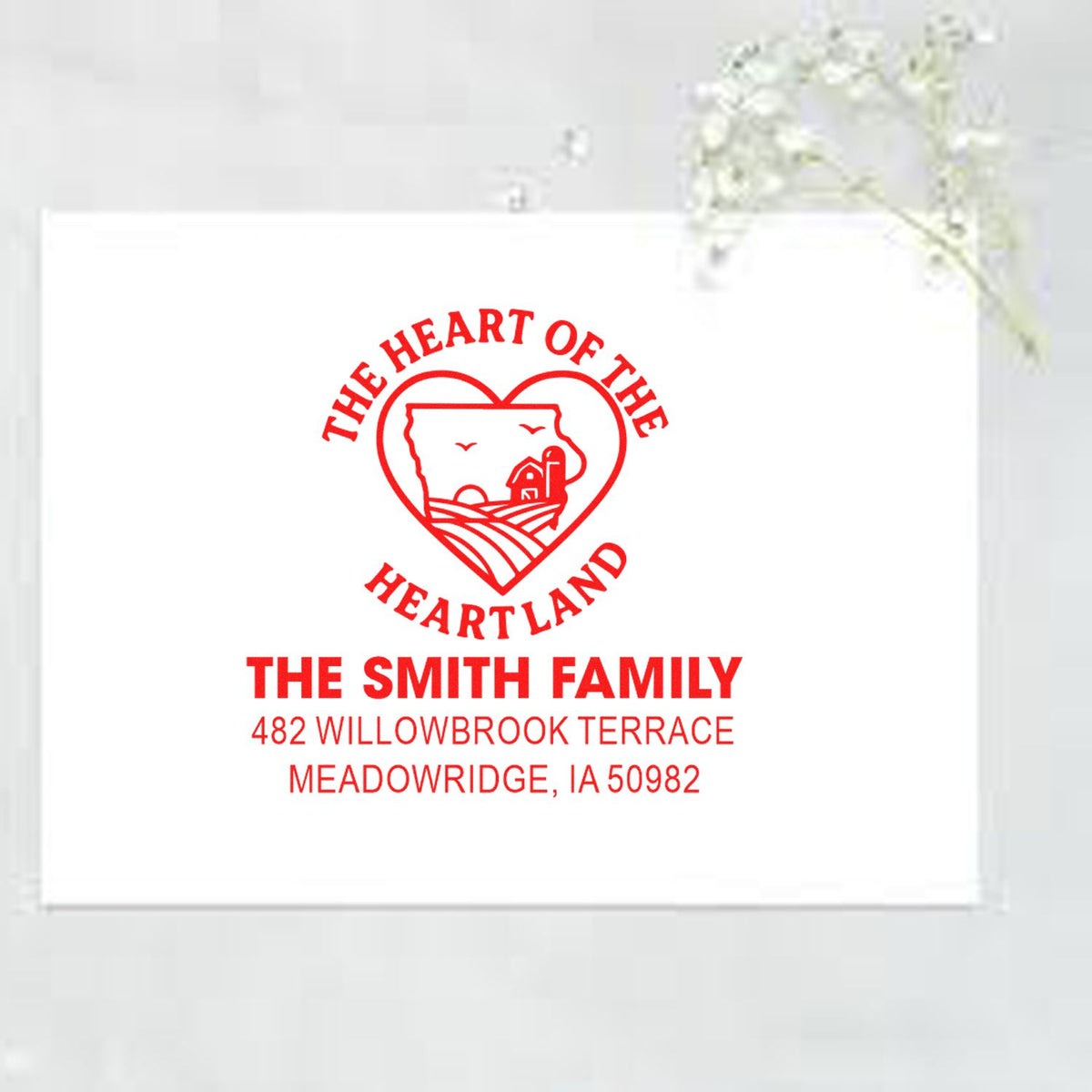 Custom family address rubber stamp with Heart of the Heartland design for The Smith Family, Meadowridge, IA.