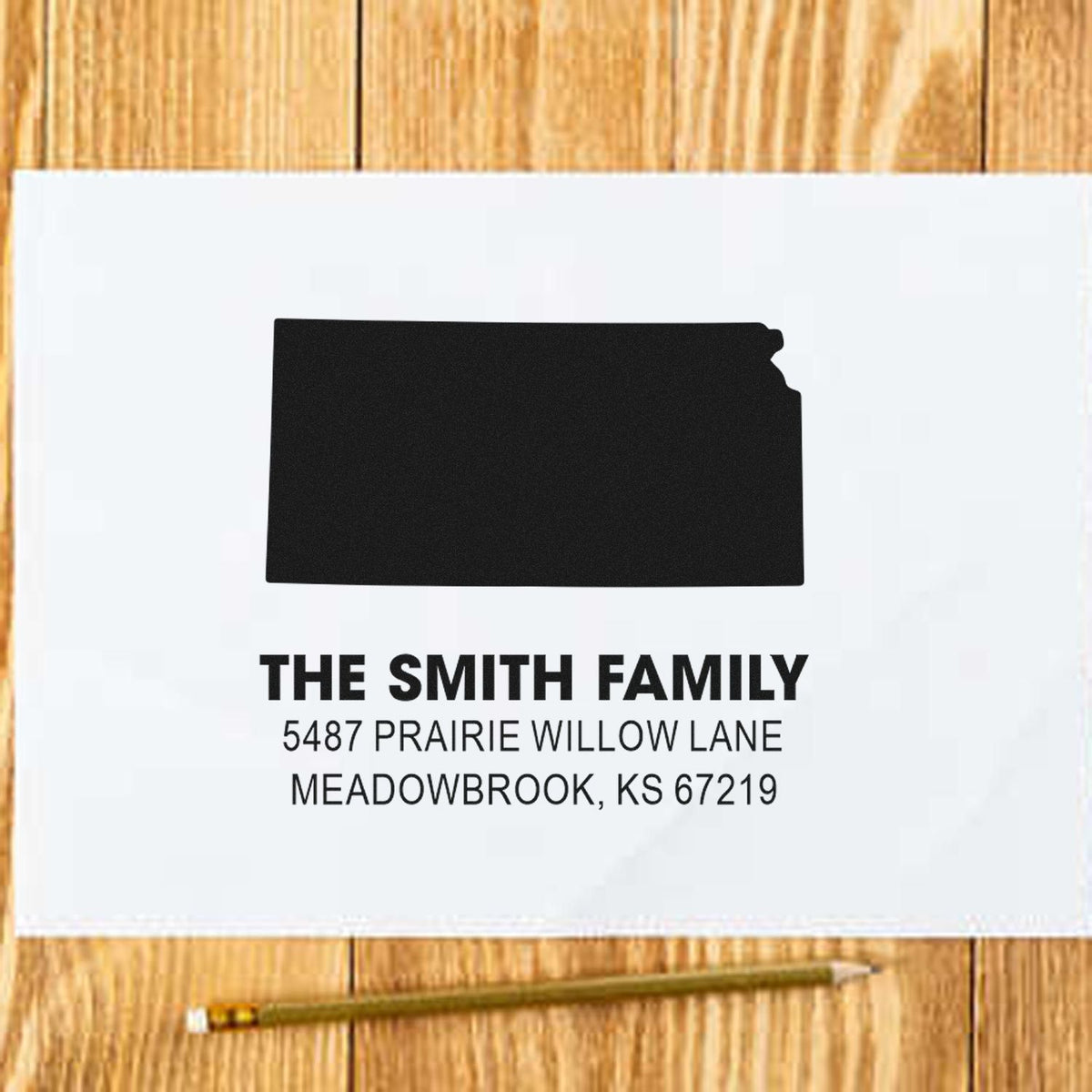 Custom address rubber stamp sample for The Smith Family return address on a mailing envelope.