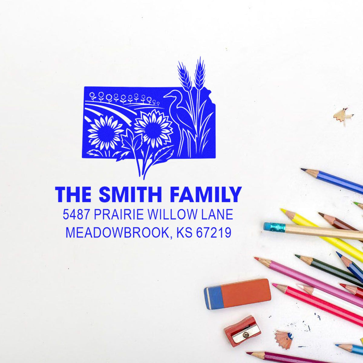 Personalized family address rubber stamp with floral and bird design for The Smith Family, Meadowbrook, KS 67219.