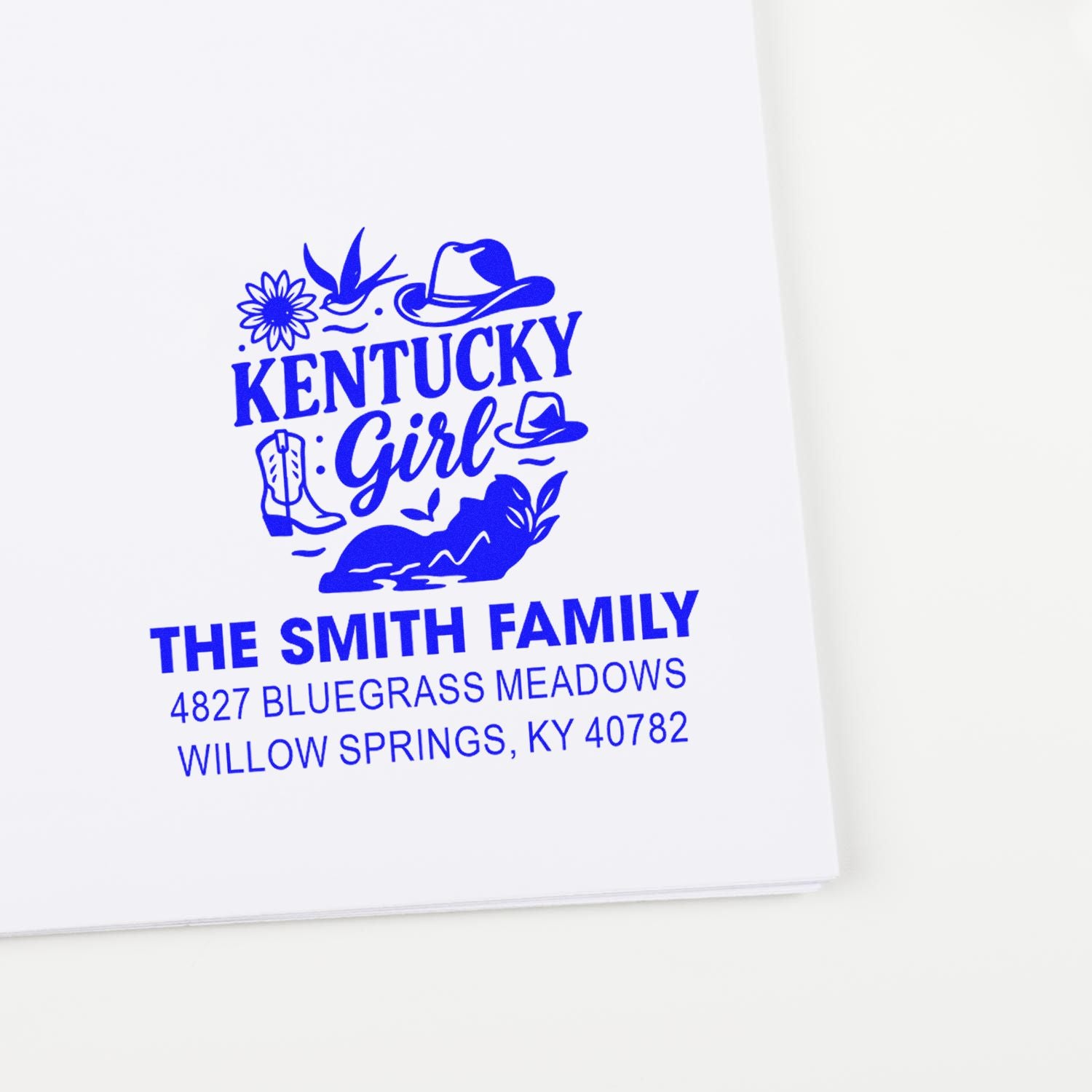 Custom Kentucky Girl return address rubber stamp for The Smith Family, with blue ink and western floral design.