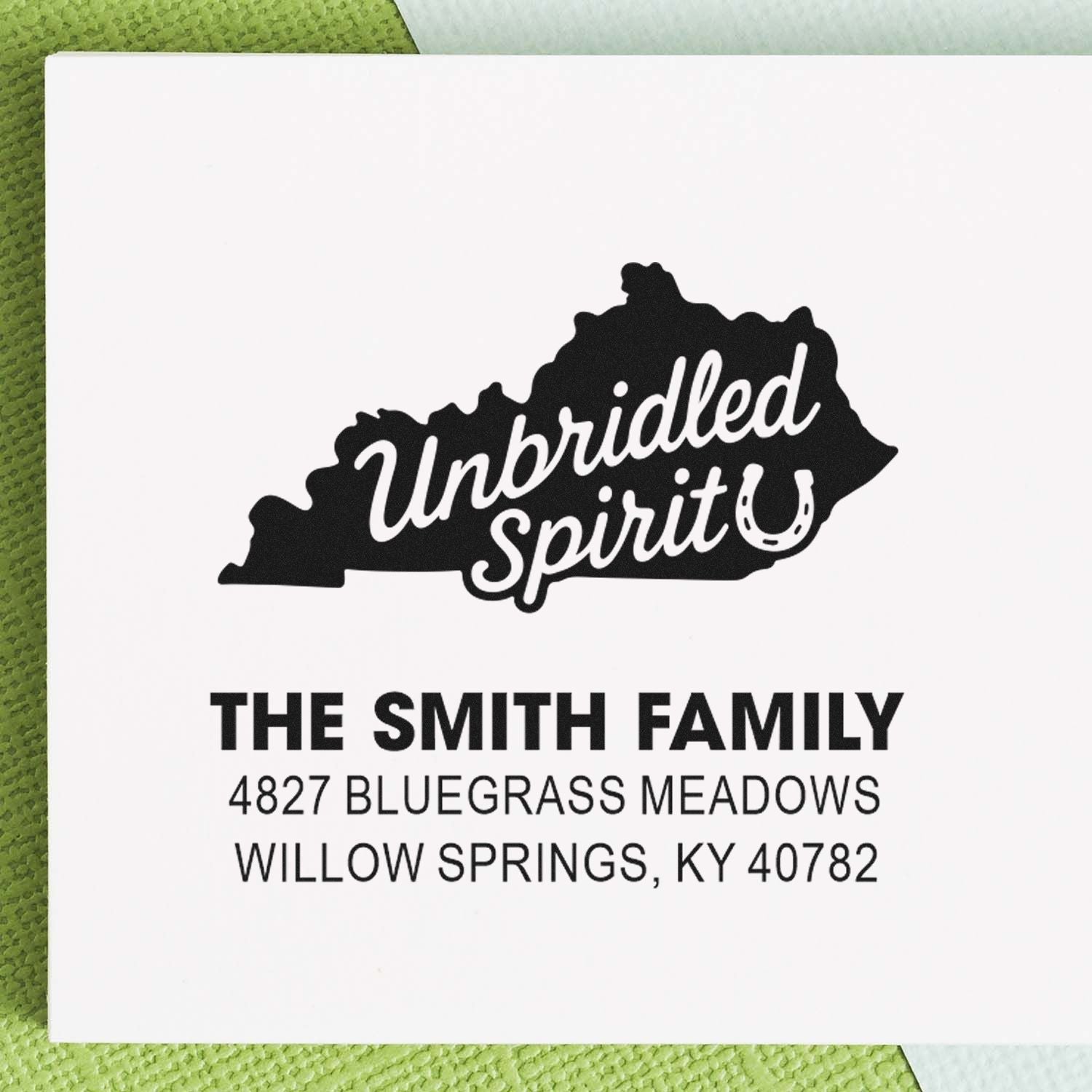Custom Kentucky return address rubber stamp with Unbridled Spirit design for The Smith Family, Willow Springs, KY.