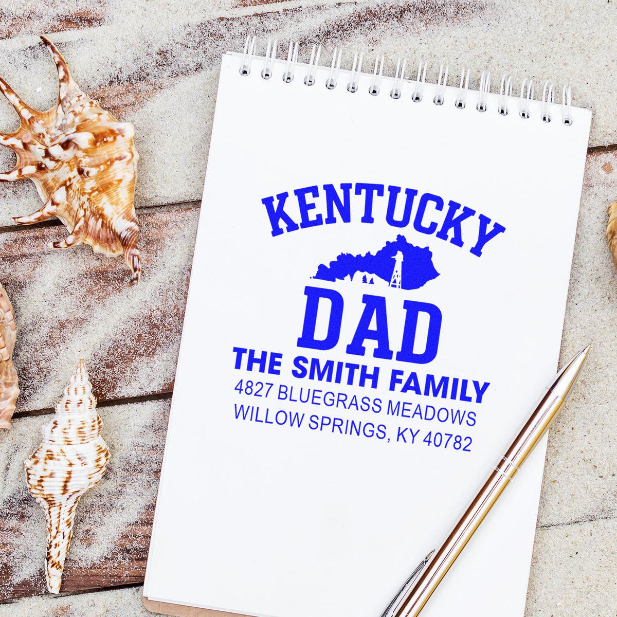Kentucky Dad custom return address rubber stamp impression on notebook with family name and Willow Springs, KY address.