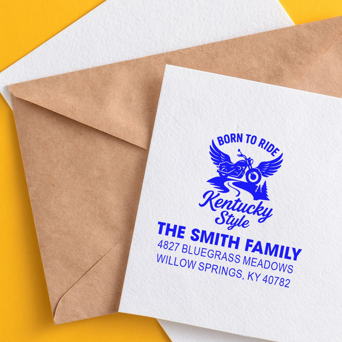 Custom rubber stamp on envelope with motorcycle-themed Kentucky family return address design.