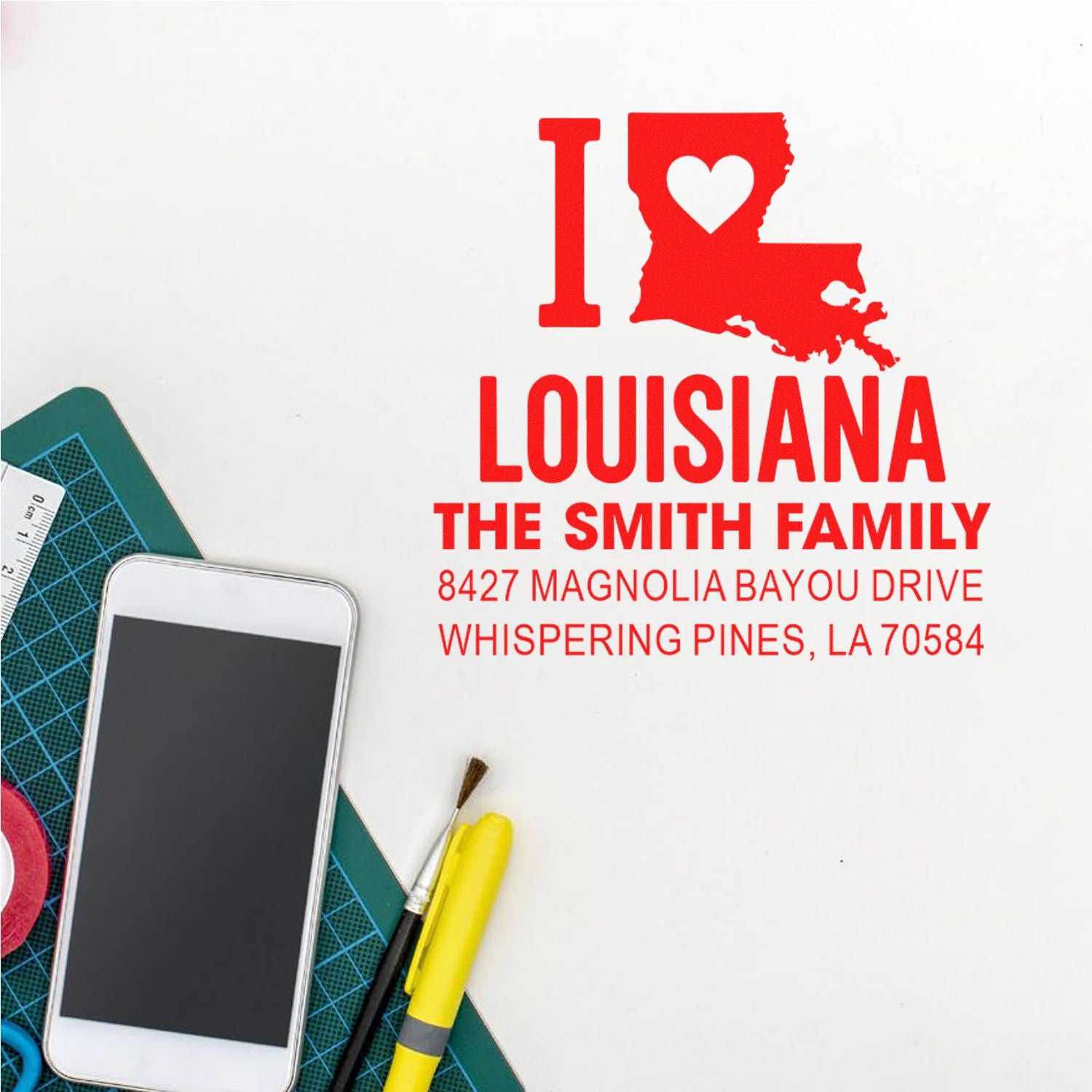 Custom Louisiana address rubber stamp with heart design for The Smith Family, featuring personalized name and address.