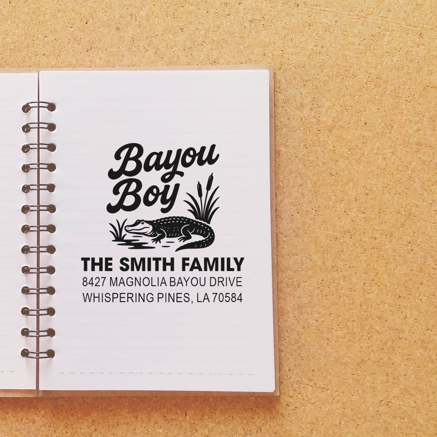 Personalized alligator address rubber stamp with Bayou Boy family name and Louisiana return address.