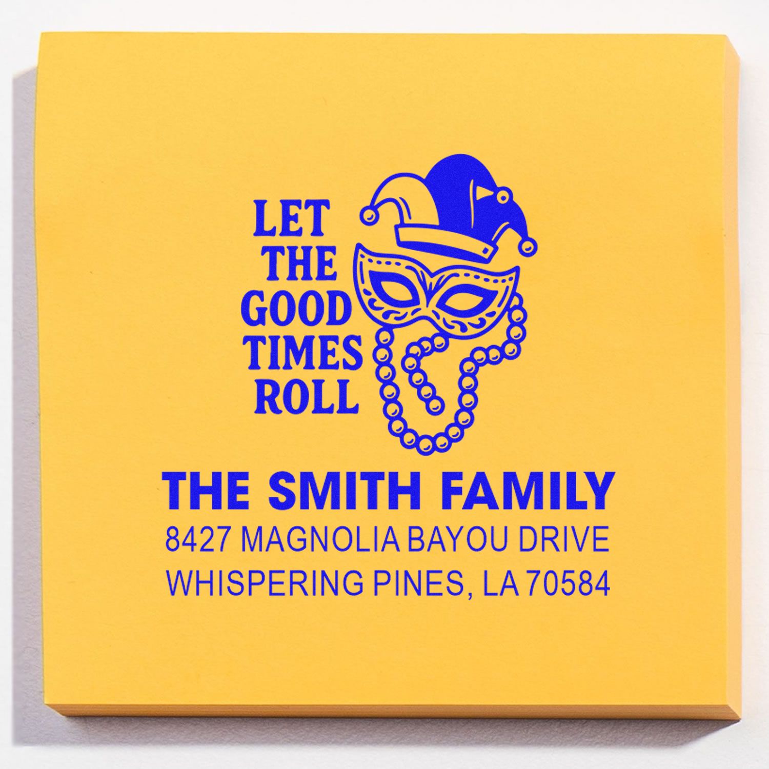 Custom rubber stamp return address for The Smith Family with Mardi Gras jester mask design.