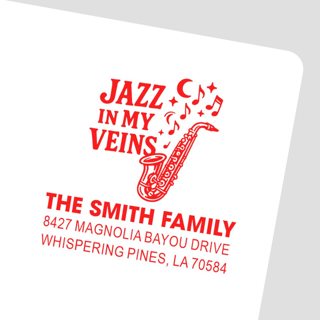 Custom jazz-themed return address rubber stamp for The Smith Family, featuring saxophone art and personalized address.