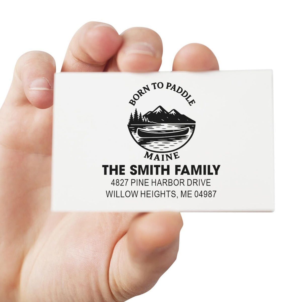 Custom rubber address stamp with Maine canoe logo and The Smith Family return address for personalized mailing.
