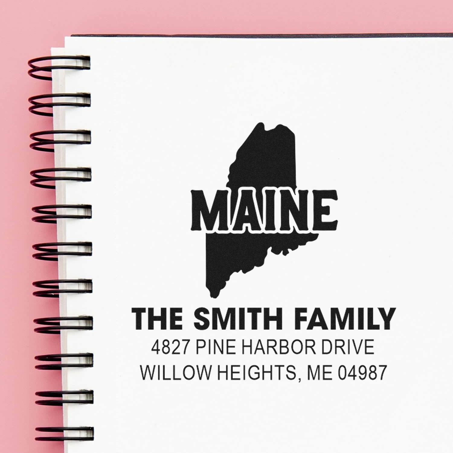 Custom Maine return address rubber stamp with state silhouette and The Smith Family name for personalized mailing.