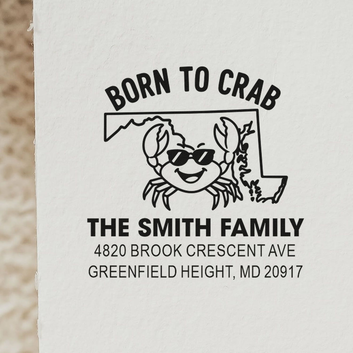Custom rubber return address stamp with Maryland crab design, Born to Crab slogan, and Smith family mailing address.
