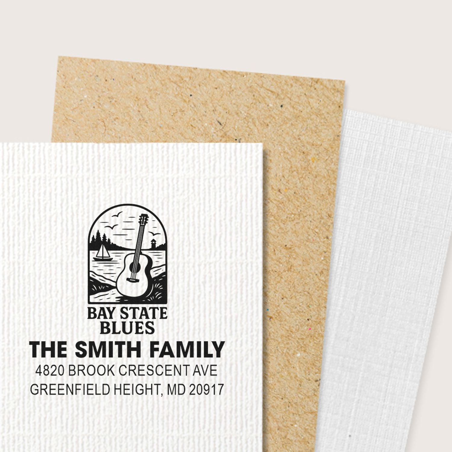 Custom family address rubber stamp with Bay State Blues guitar logo for The Smith Family, Greenfield Height, MD 20917.