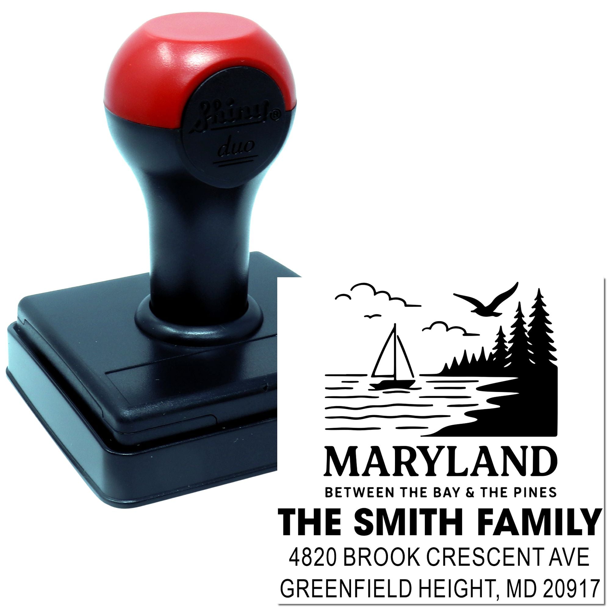Custom self-inking rubber address stamp with Maryland family name and scenic state design for personalized mail.
