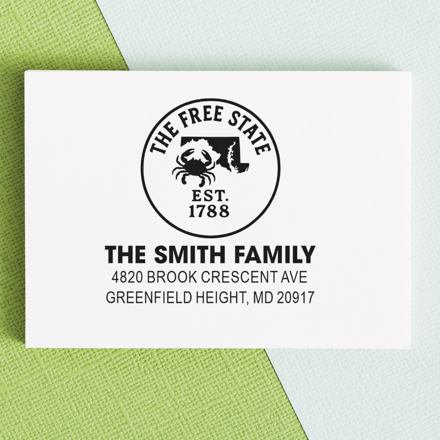 Personalized rubber address stamp for The Smith Family with Free State Maryland design and Greenfield Height, MD address.