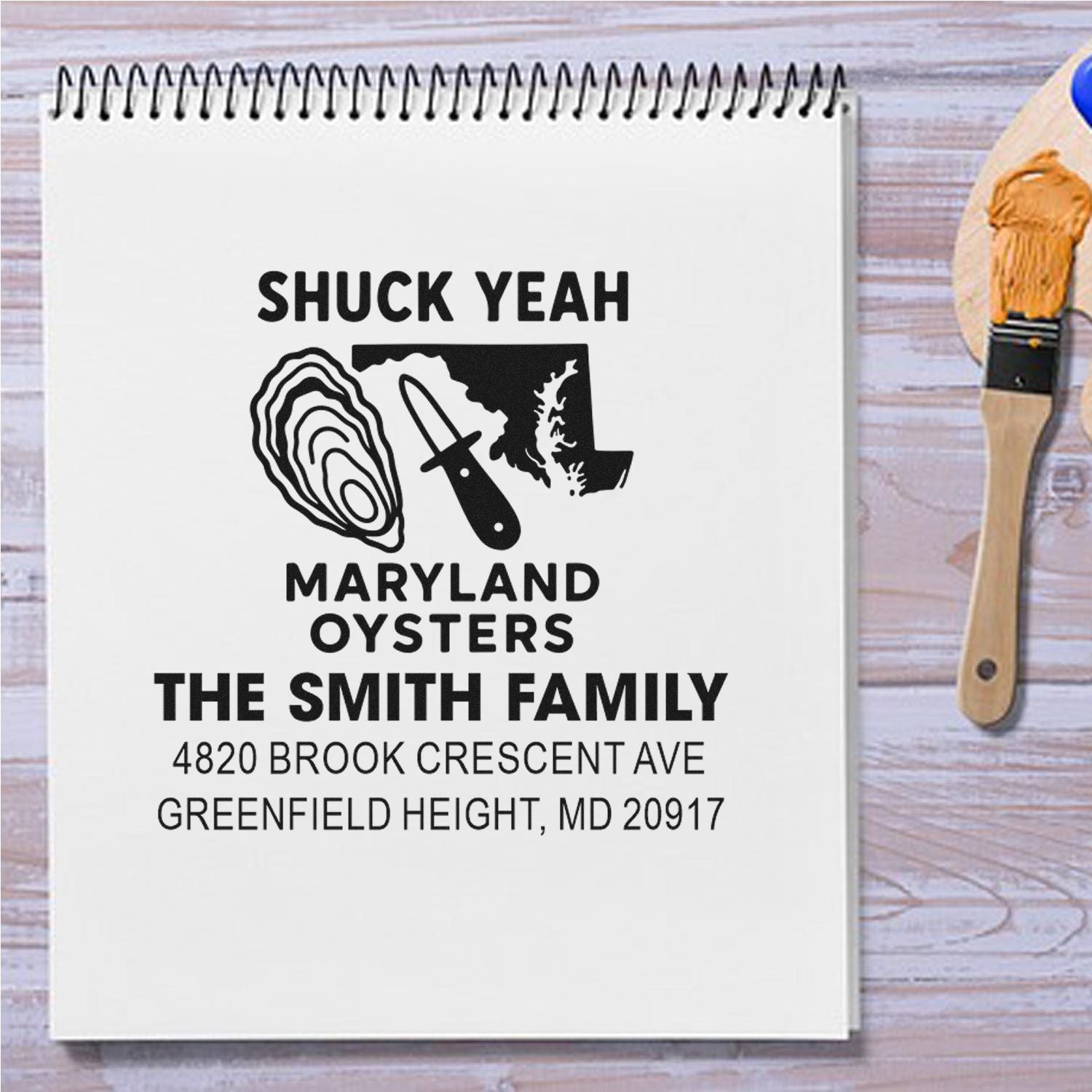 Custom rubber stamp mockup for Maryland oysters, featuring The Smith Family name and address on a personalized address stamp design.