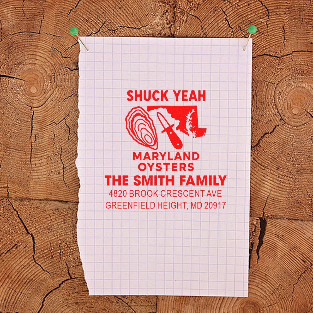 Custom Maryland oysters rubber stamp with family name and address, shown as a red stamp imprint on paper.