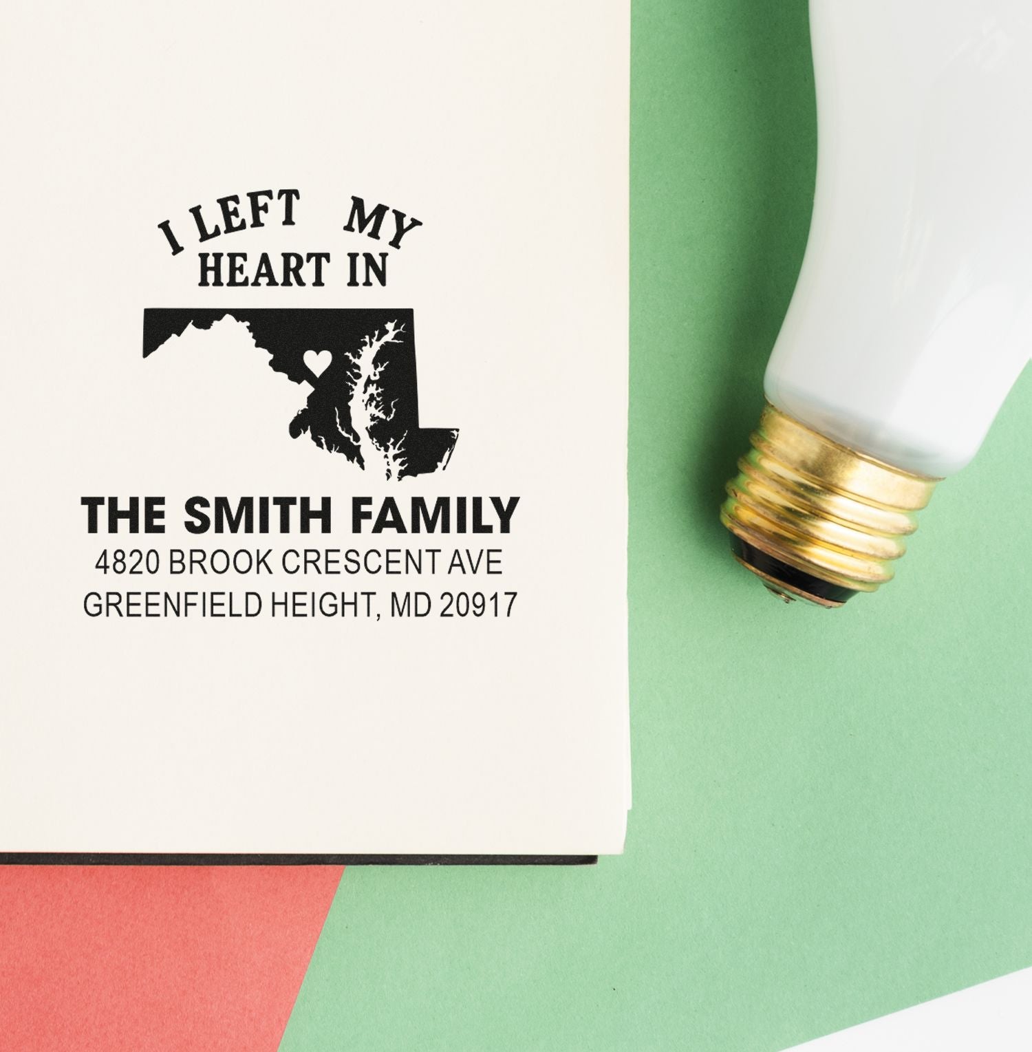 Custom return address rubber stamp with Maryland heart design, The Smith Family name, and Greenfield Height, MD address.
