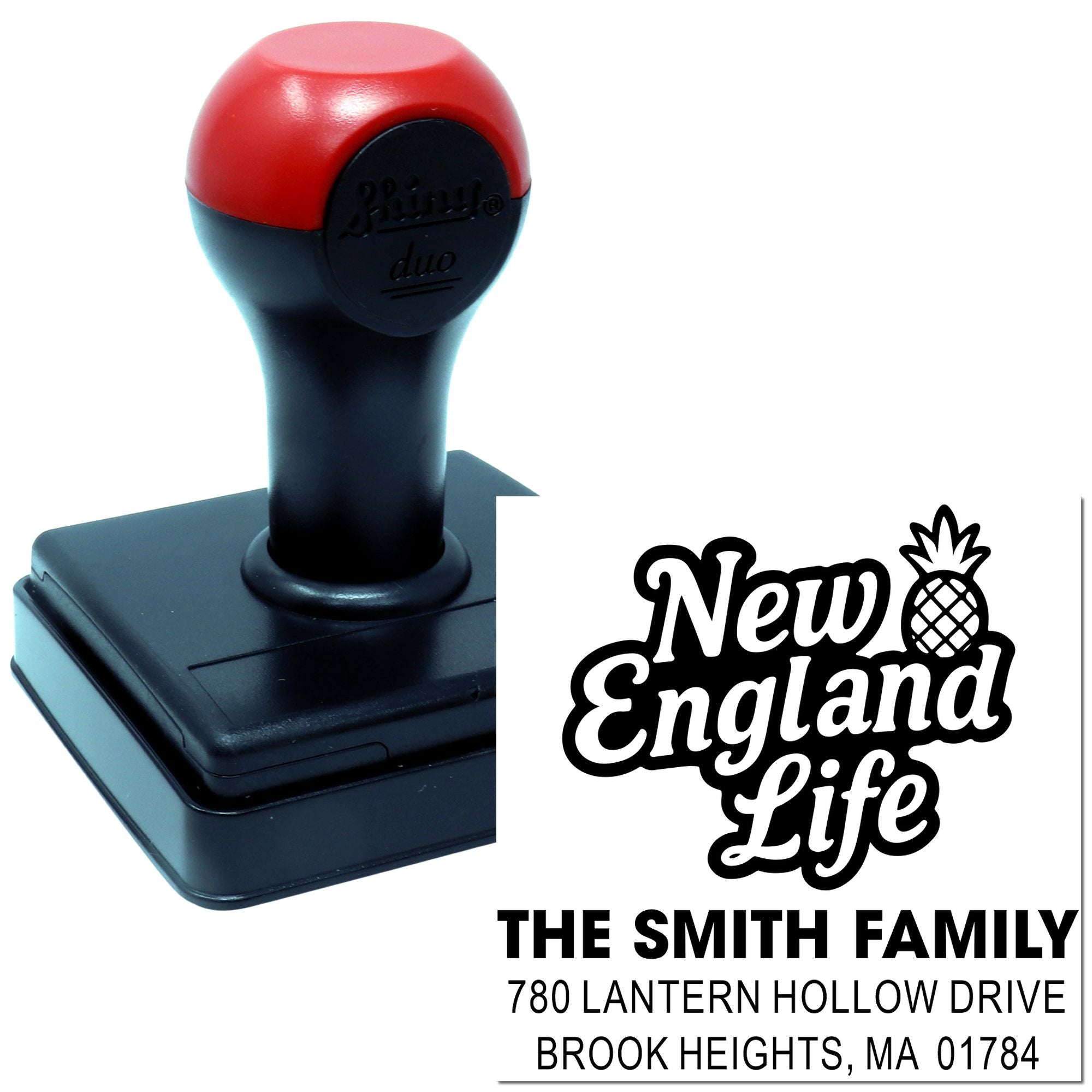 Custom self-inking rubber stamp with New England Life design and Smith family address for personalized mail and branding.