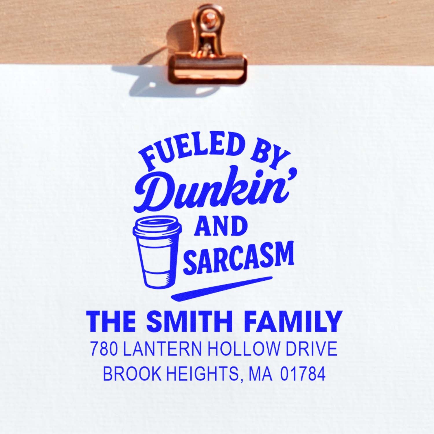 Custom rubber stamp with Fueled by Dunkin and Sarcasm design and The Smith Family address imprint.