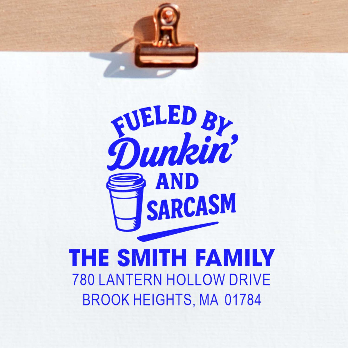 Custom rubber stamp with Fueled by Dunkin and sarcasm and The Smith Family address for personalized mailings.