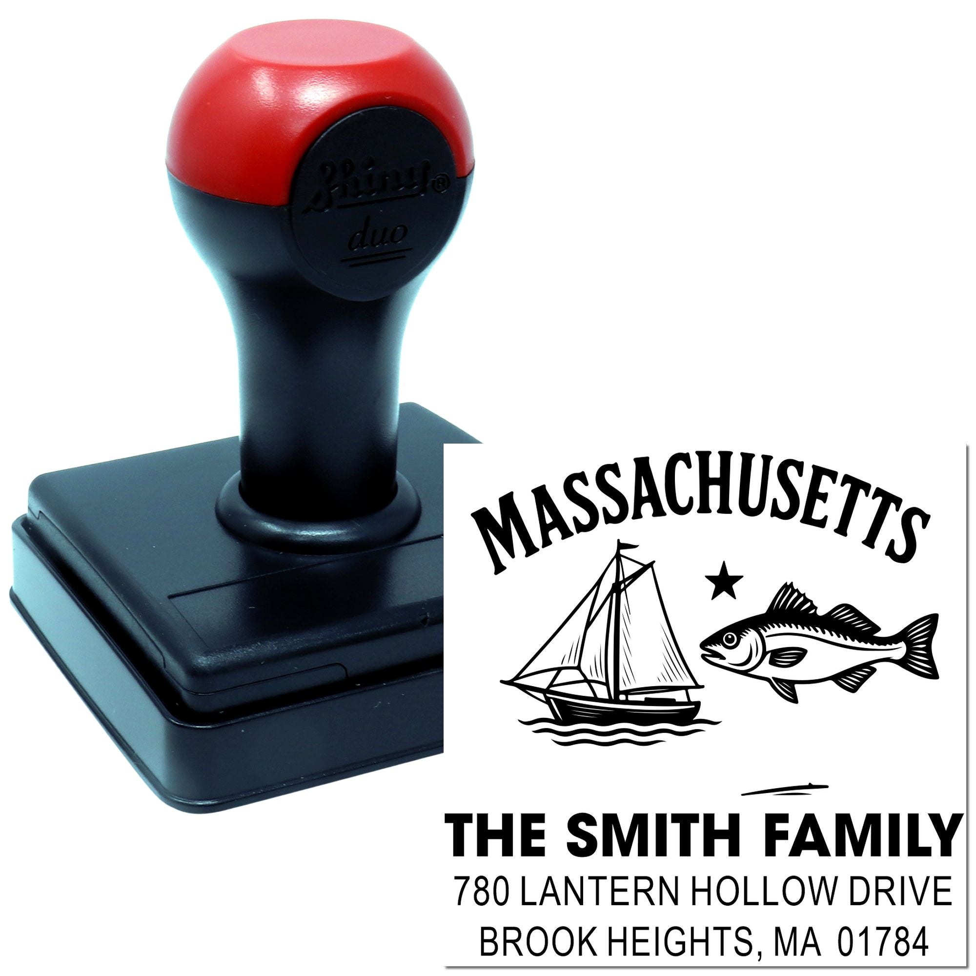 Custom Massachusetts address rubber stamp with sailboat and fish design, shown with self-inking stamp impression.