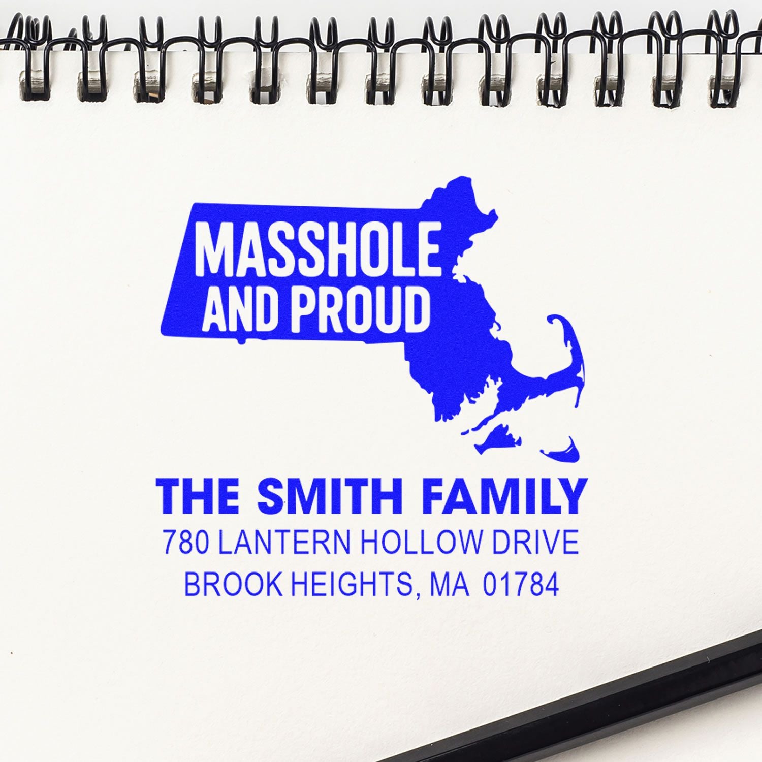 Custom Massachusetts return address rubber stamp for The Smith Family, with state silhouette and printed address.