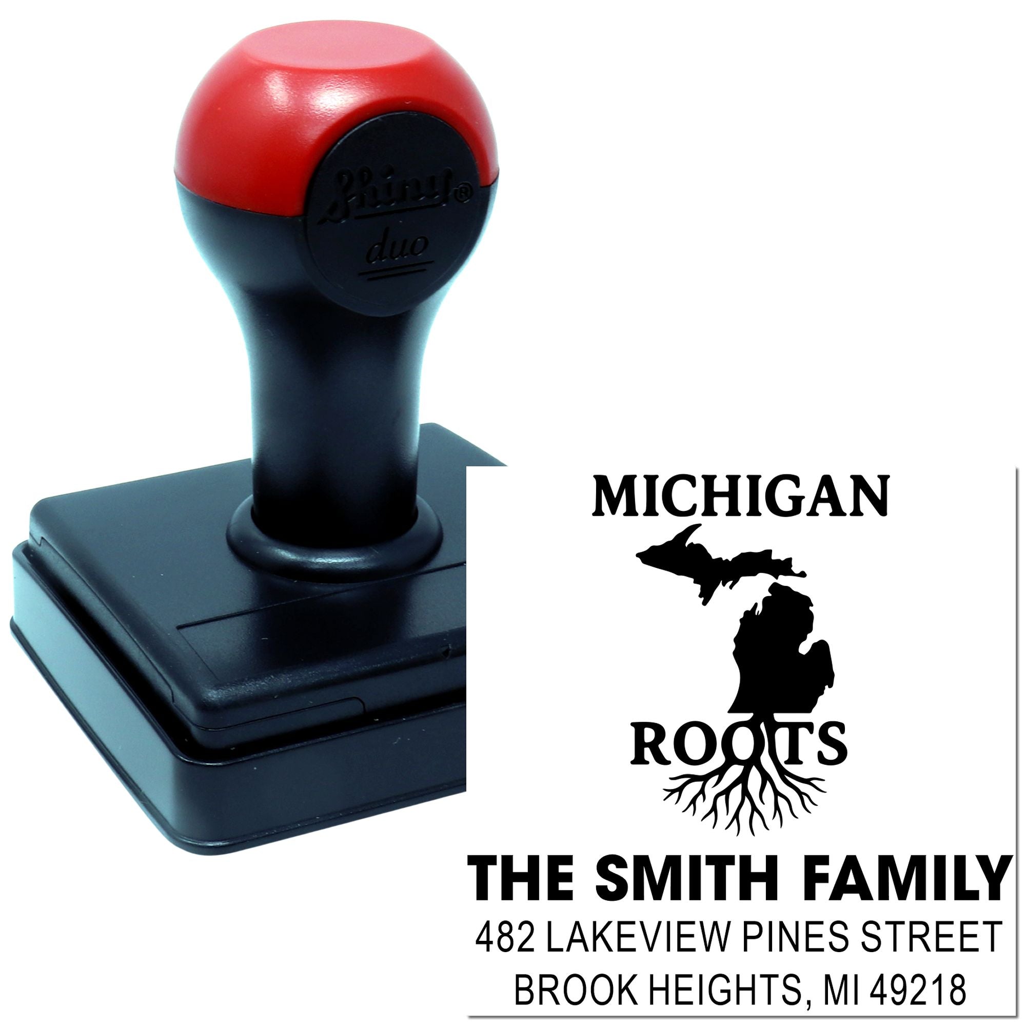 Custom self-inking return address rubber stamp with Michigan Roots design for The Smith Family and home address.