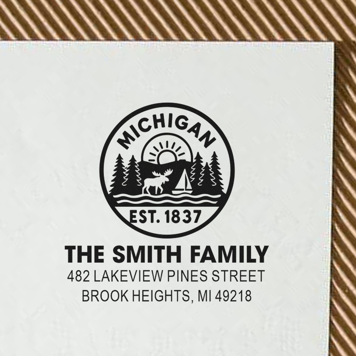 Personalized Michigan return address rubber stamp with cabin, moose and lake logo for The Smith Family, Brook Heights, MI 49218.