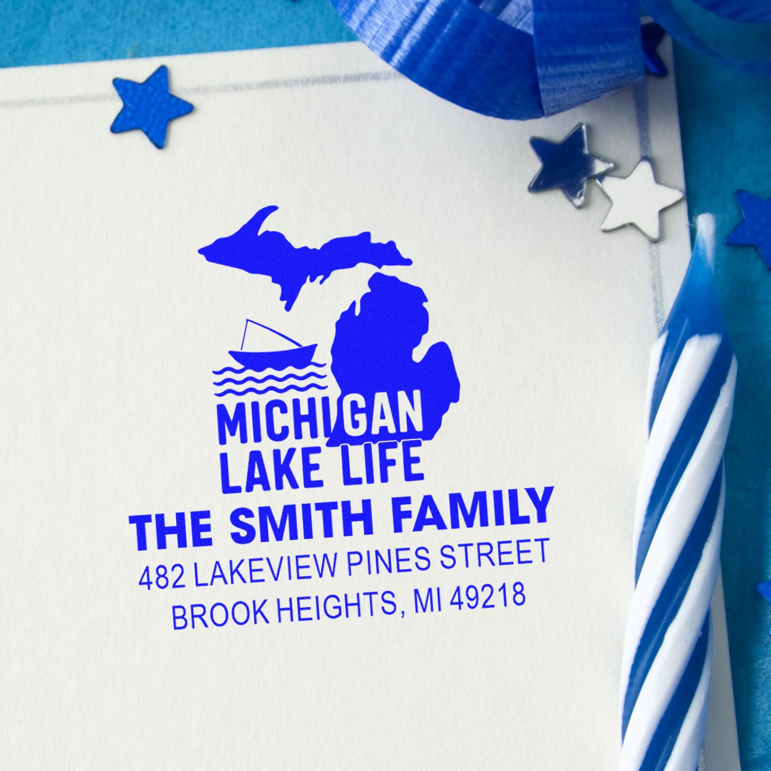 Custom Michigan Lake Life rubber stamp with family name and return address for personalized mail and stationery.