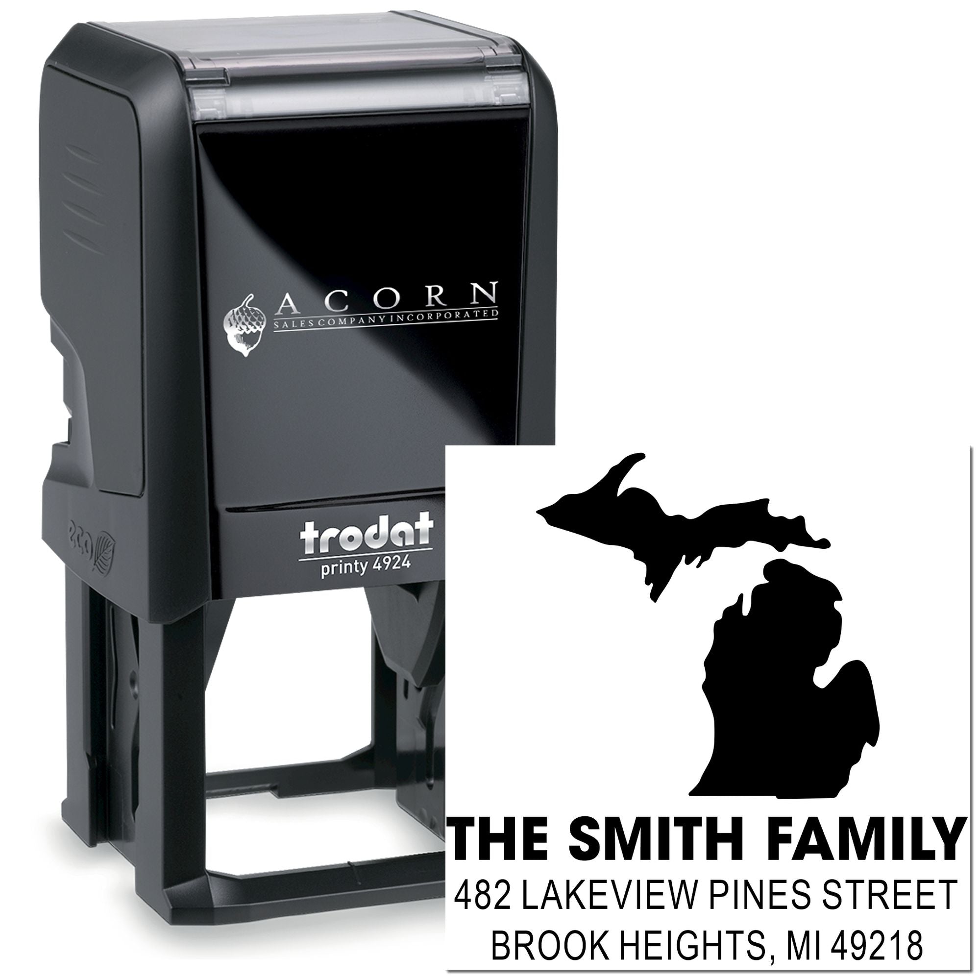 Custom self-inking address stamp with Michigan silhouette, family name, and return address for personalized rubber stamping.