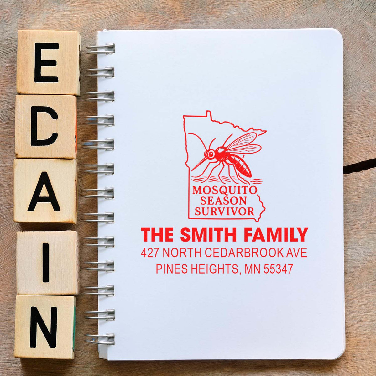 Personalized rubber address stamp for The Smith Family with Mosquito Season Survivor design, Pines Heights, MN.