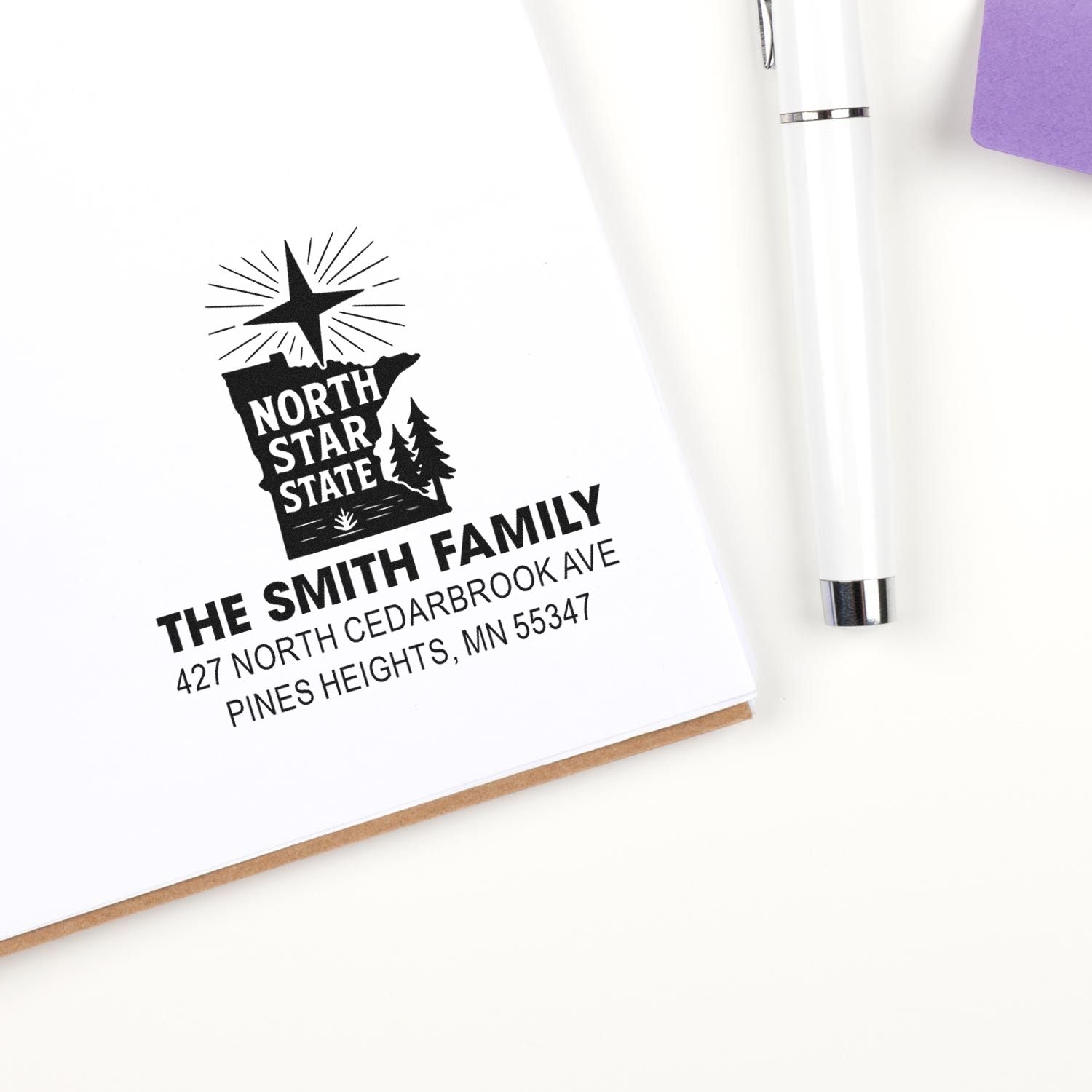 Custom return address rubber stamp with North Star State design for The Smith Family, Pines Heights, MN.