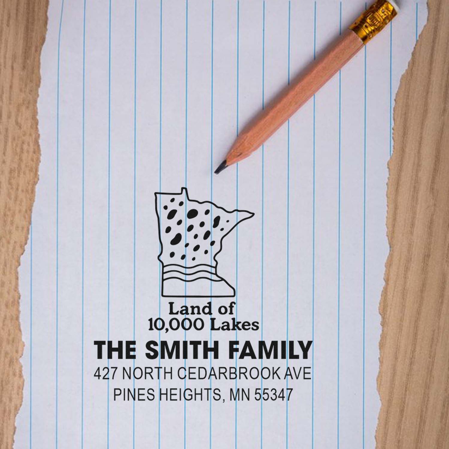 Custom Minnesota return address rubber stamp for The Smith Family, featuring a Land of 10,000 Lakes logo and address.