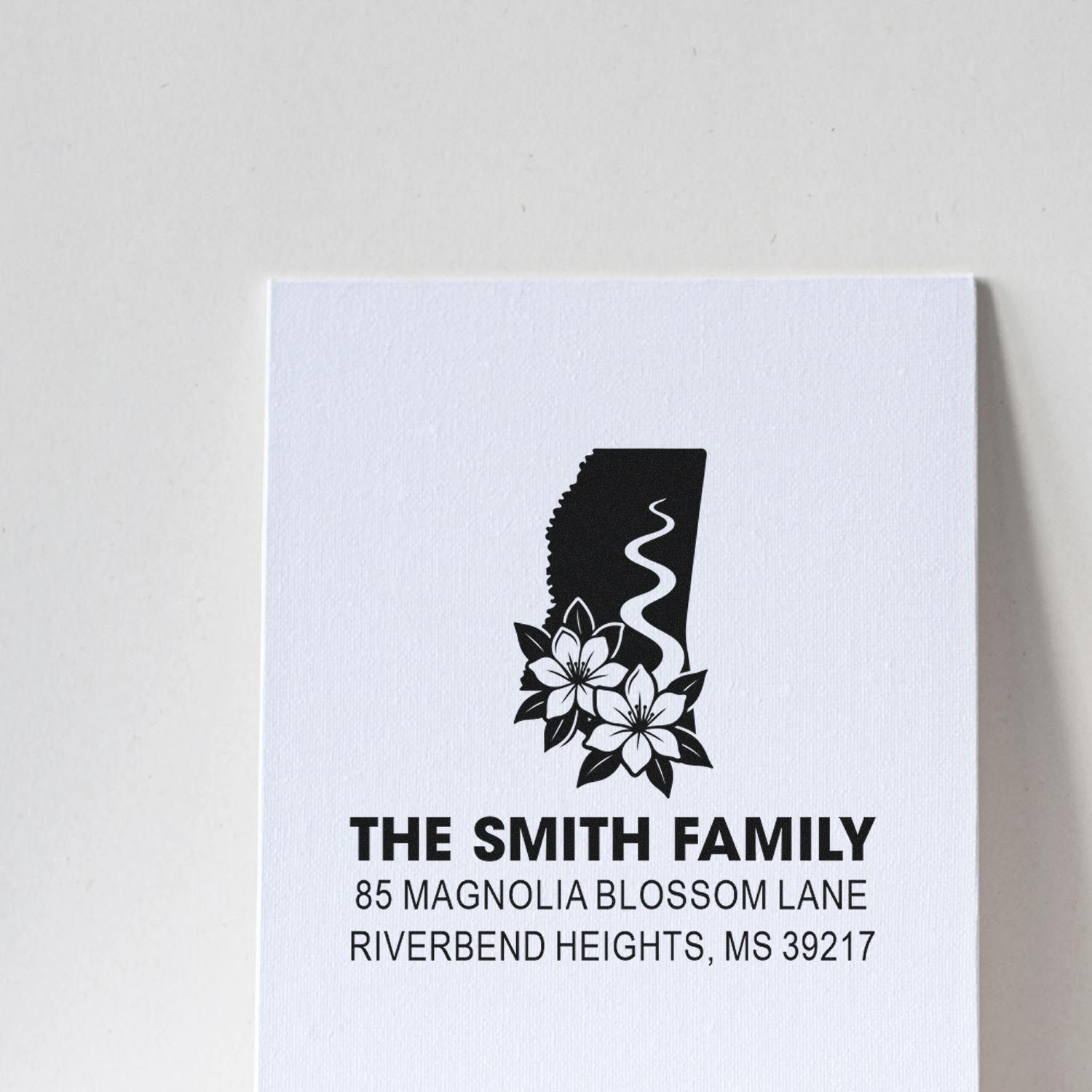 Personalized address rubber stamp with Mississippi state design and flowers for The Smith Family mailings.
