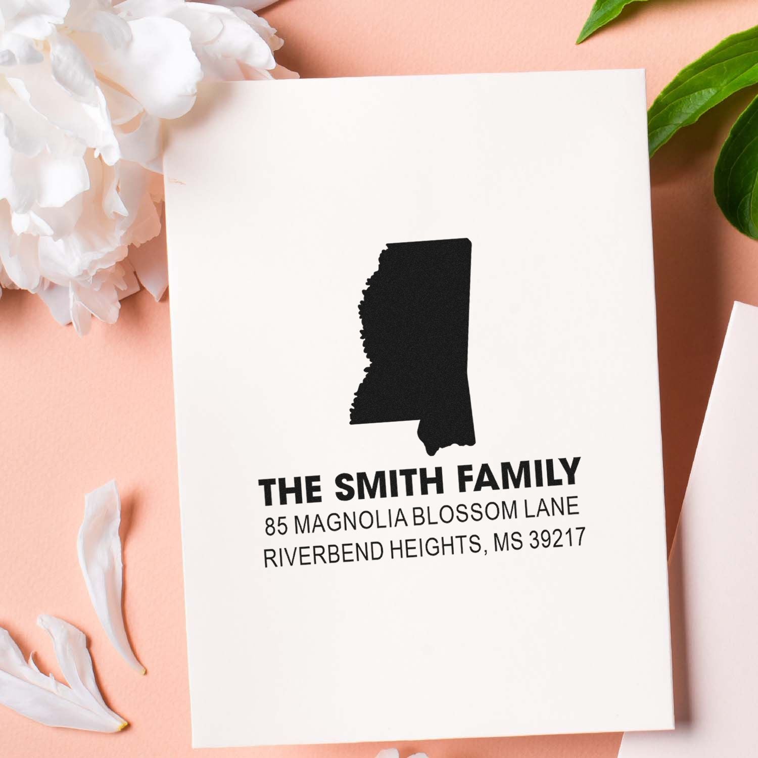 Custom Mississippi family return address rubber stamp with name and address for personalized envelopes.