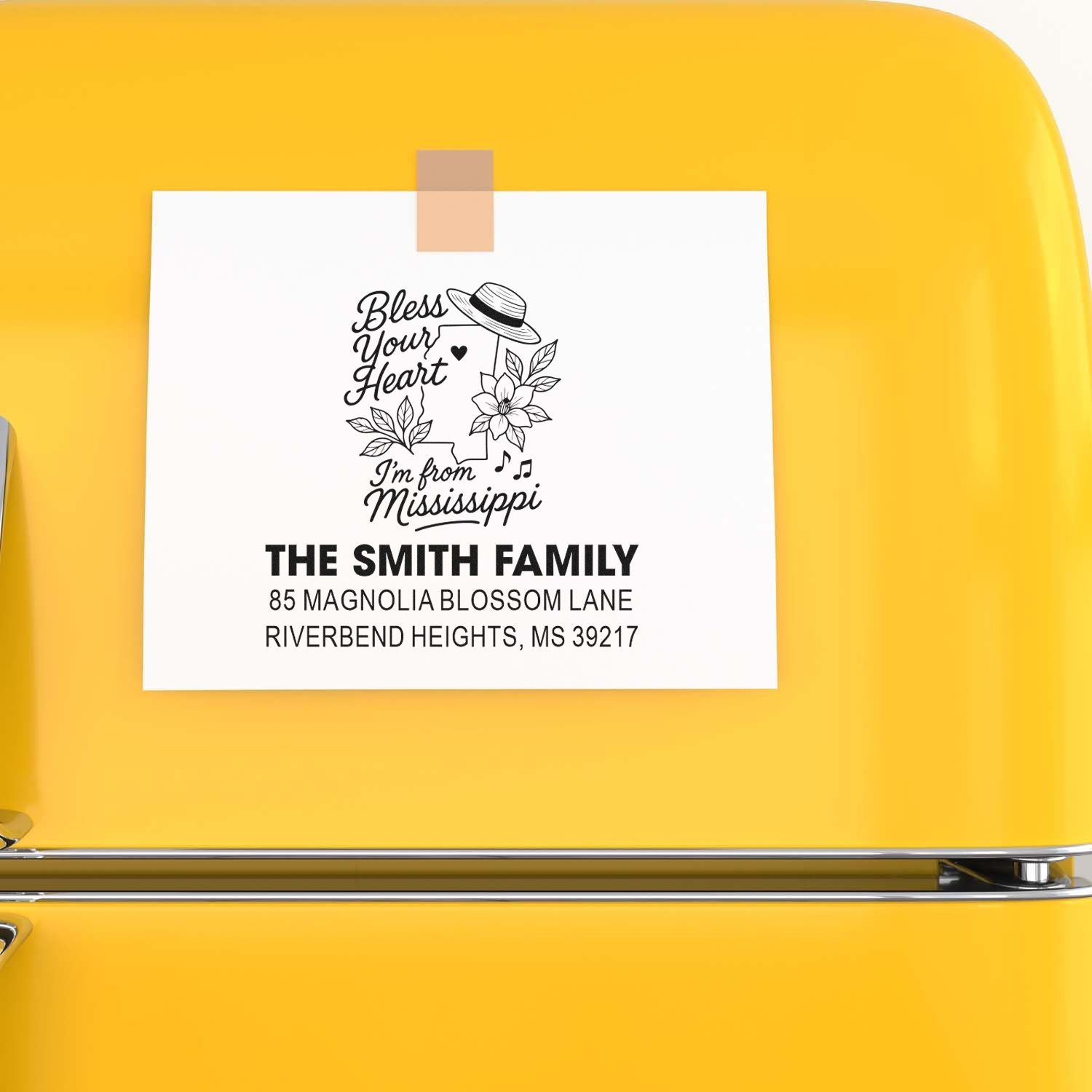 Custom Mississippi family address rubber stamp design on a yellow refrigerator, featuring Bless Your Heart, Im from Mississippi.