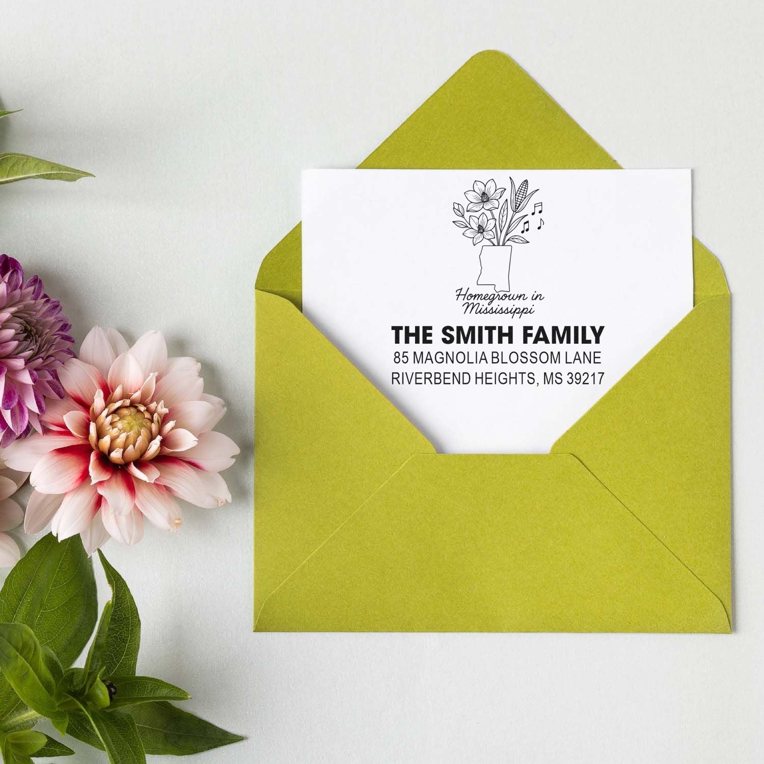 Personalized return address rubber stamp for the Smith family, Homegrown in Mississippi, with floral design and address.