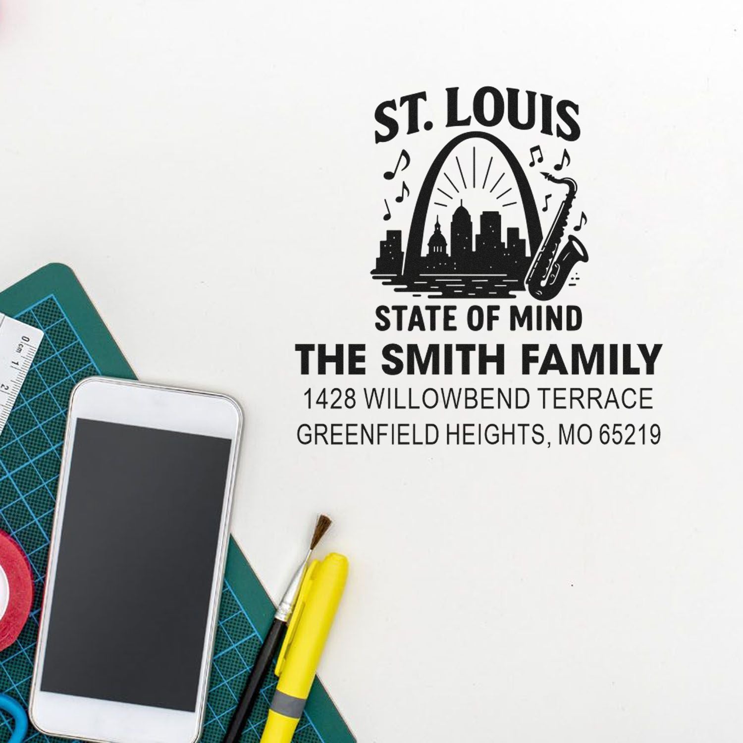 Custom family address rubber stamp with St. Louis skyline, saxophone graphic, and The Smith Family mailing details.