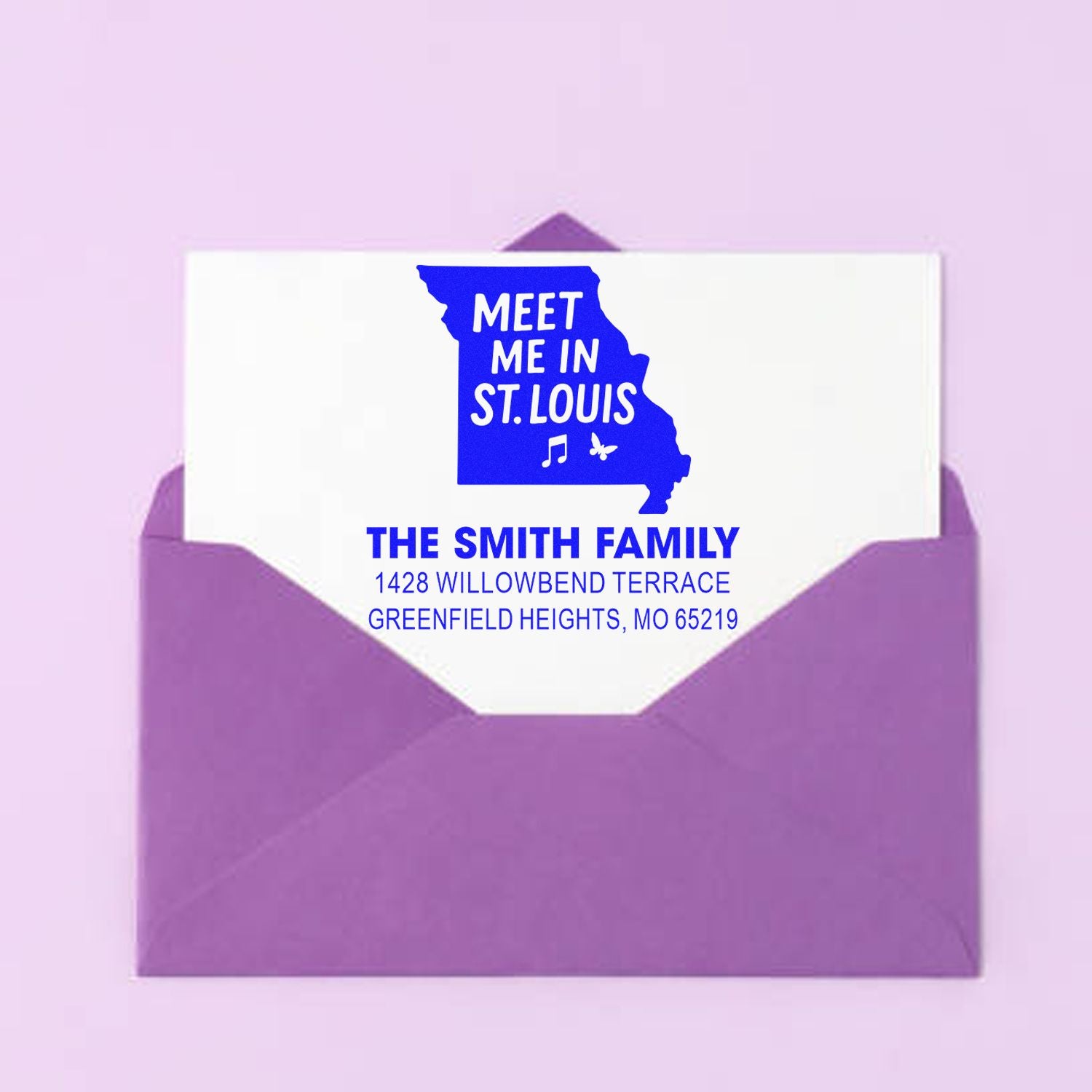 Personalized return address rubber stamp on envelope with Meet Me in St. Louis Missouri design for The Smith Family.