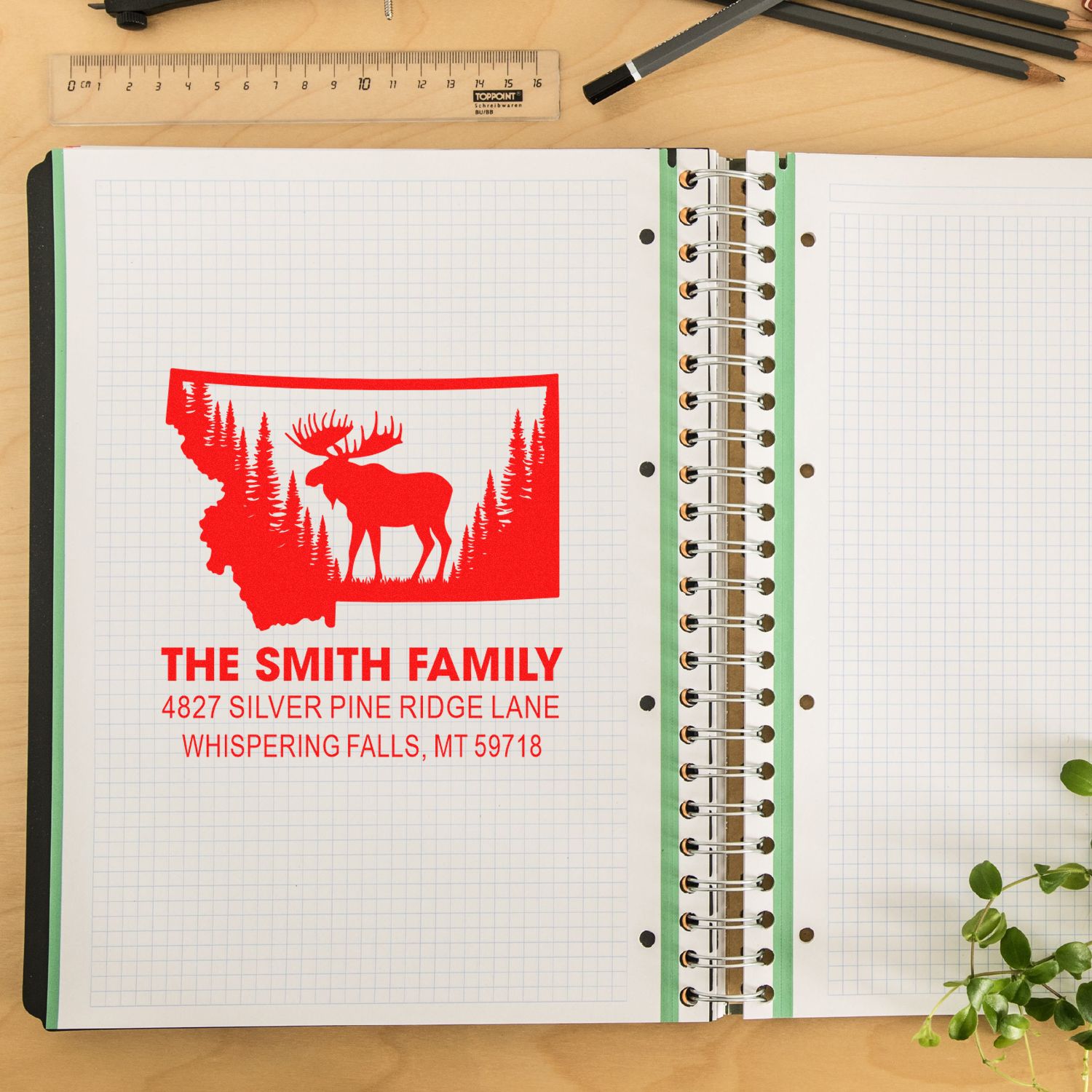 Custom family address rubber stamp with Montana elk design for personalized return address labels and mailing envelopes.