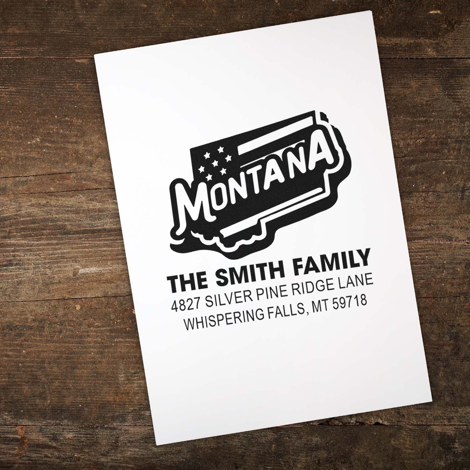 Custom Montana address rubber stamp with family name for personalized mailings and stationery.