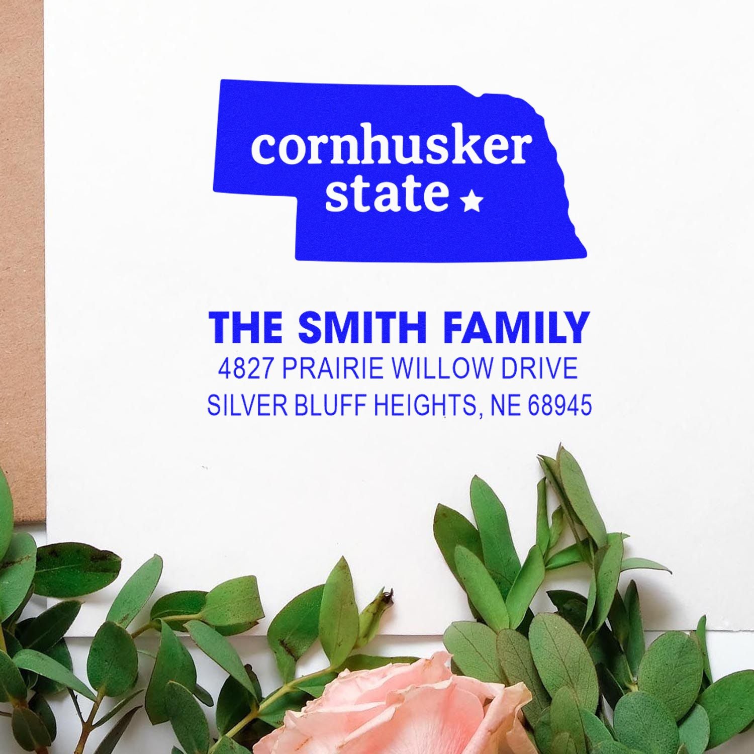 Custom Nebraska return address rubber stamp for The Smith Family with Cornhusker State design and Silver Bluff Heights address.