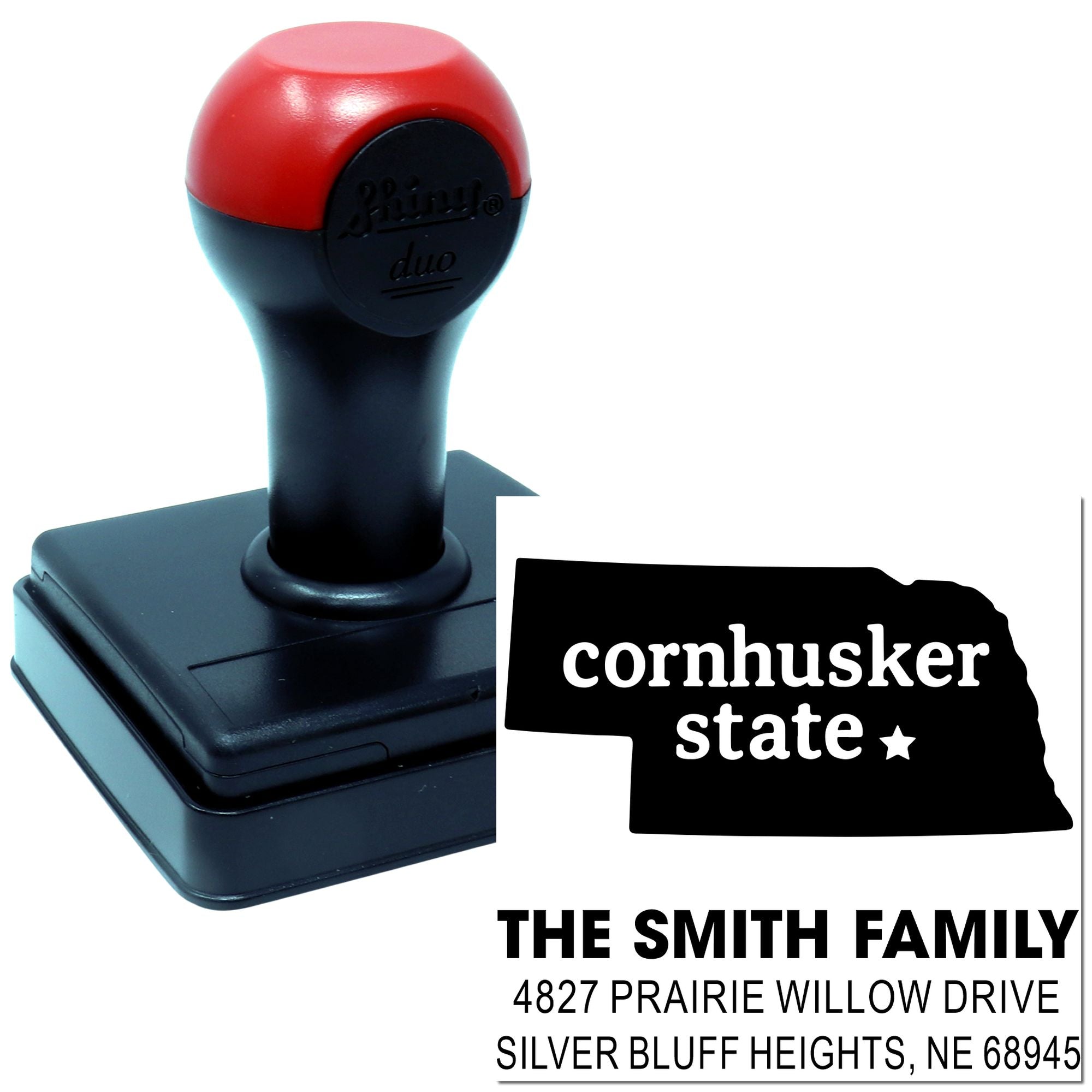 Custom self-inking address rubber stamp with Nebraska Cornhusker State design and The Smith Family mailing address.