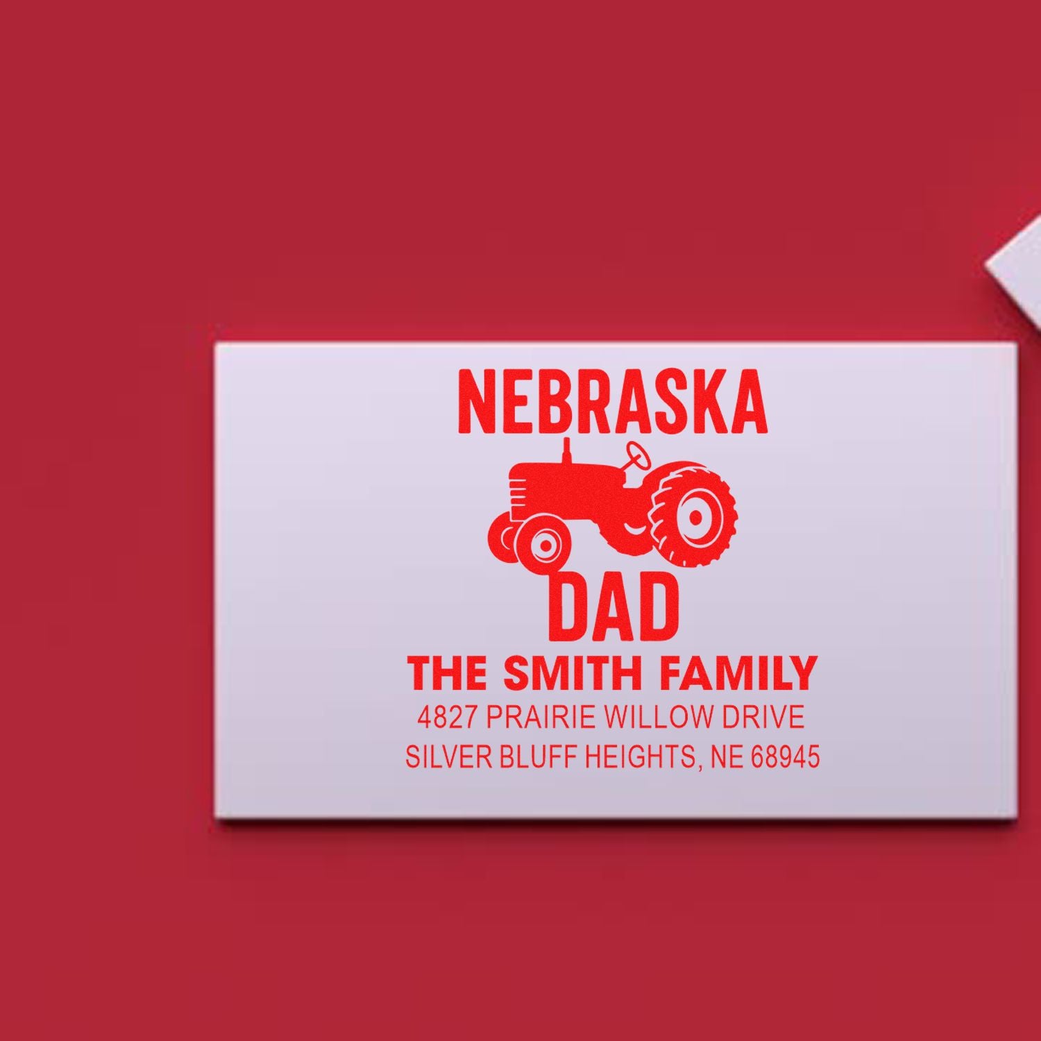Custom Nebraska Dad rubber address stamp with tractor, The Smith Family, and Silver Bluff Heights, NE address.