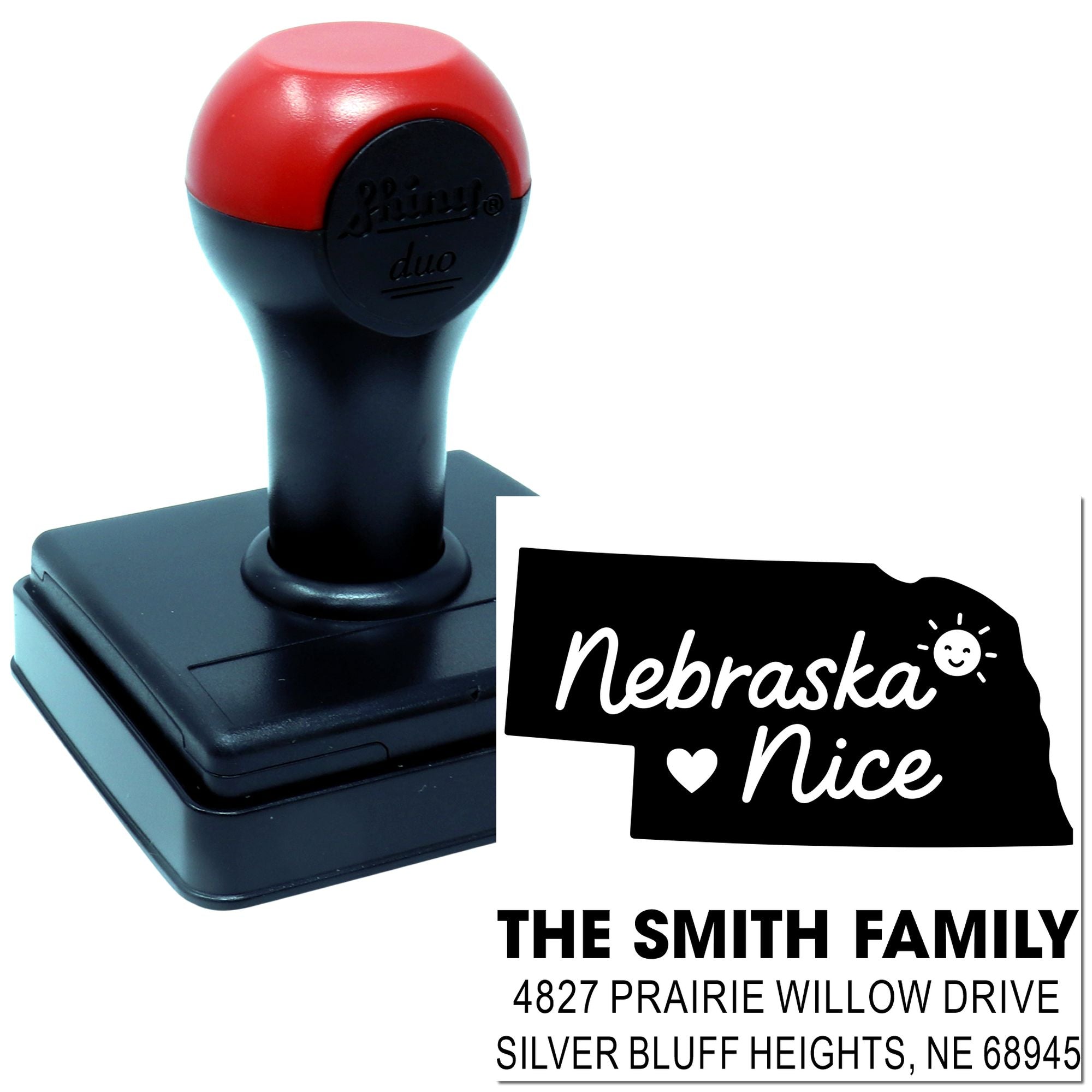 Custom self-inking rubber stamp with Nebraska Nice design and return address, ideal for personalized family mailing labels.