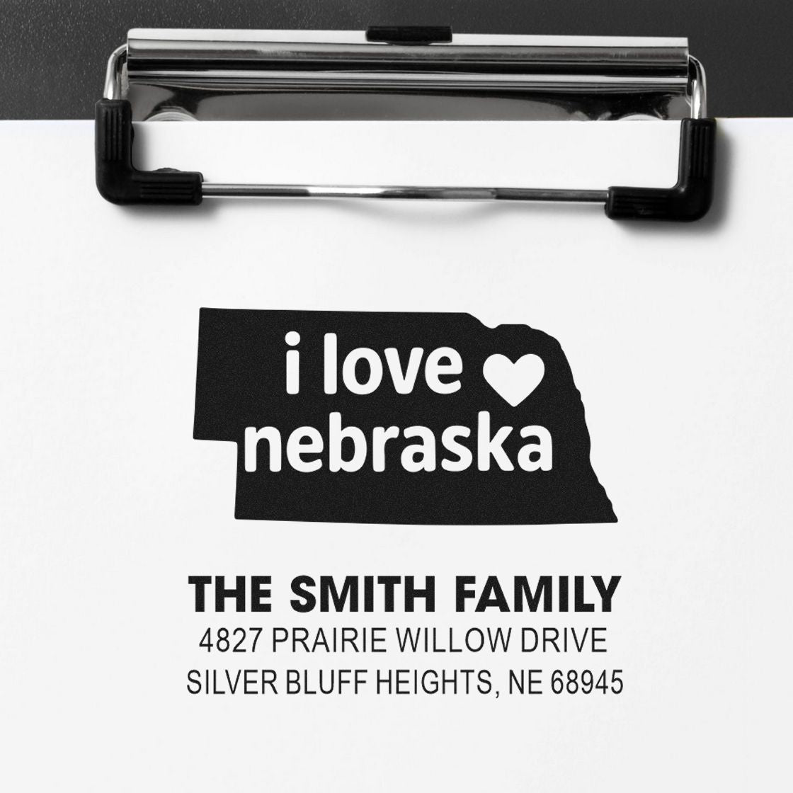 Custom Nebraska return address rubber stamp for the Smith family with personalized mailing details.